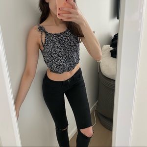 Brandy melville navy with white flower tank style not sold anymore